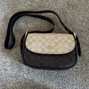 Macie Saddle Bag in Blocked Signature Canvas